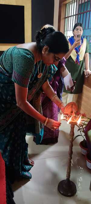Lighting of the lamp by Chief speaker Saroja Sarangi Ma'am on eve of NSS DAY 
